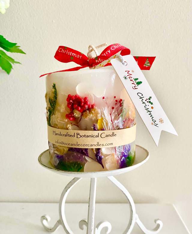 Botanical handmade candle with preserved flowers and layered wax design, where only the inner soy candle burns and the outer floral layers remain to be enjoyed later as a lantern with an LED light – Ocean Decor Candles Gold Coast