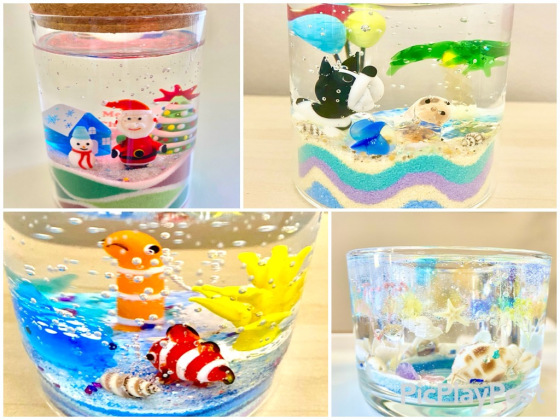 Some designs from the Kids Candle Workshop at Ocean Decor Candles Gold Coast, showing creative candle ideas children can make — ocean, dog, and Christmas themes with layered sand art, seashells, and glass figurines.