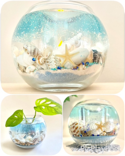 Handmade coastal gel art lantern with seashells and sand in a hollow-center glass jar designed to hold an LED or real tealight candle.