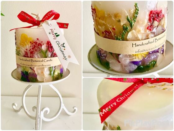 Handmade botanical candle with preserved flowers. The inner soy candle burns while the outer botanical shell stays intact and can be reused as an LED lantern.